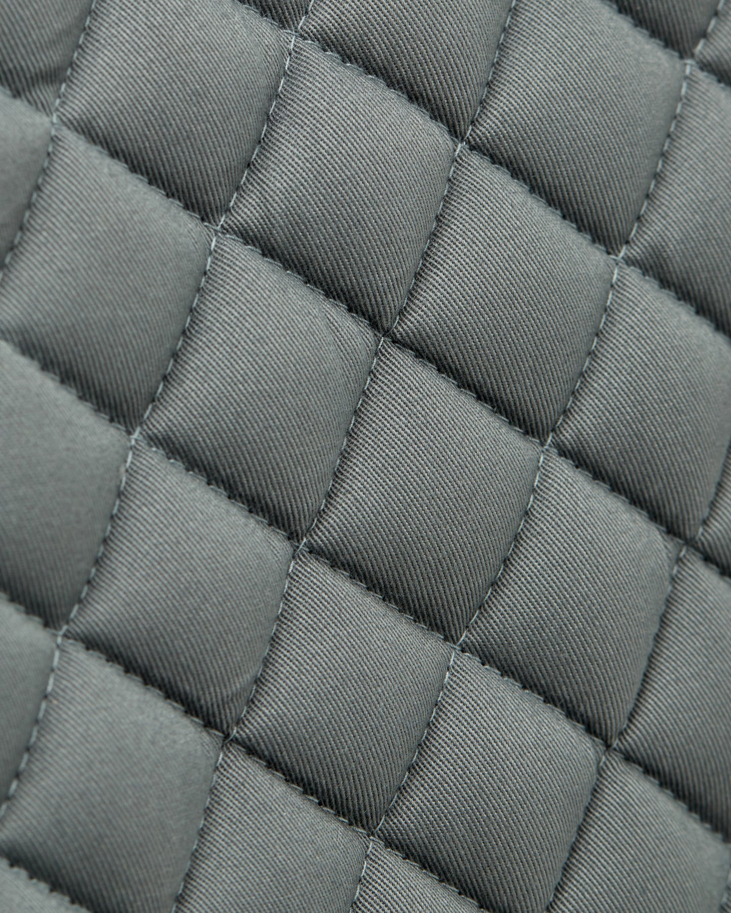 Equestrian navy quilted cotton dressage saddle pad/numnahs.