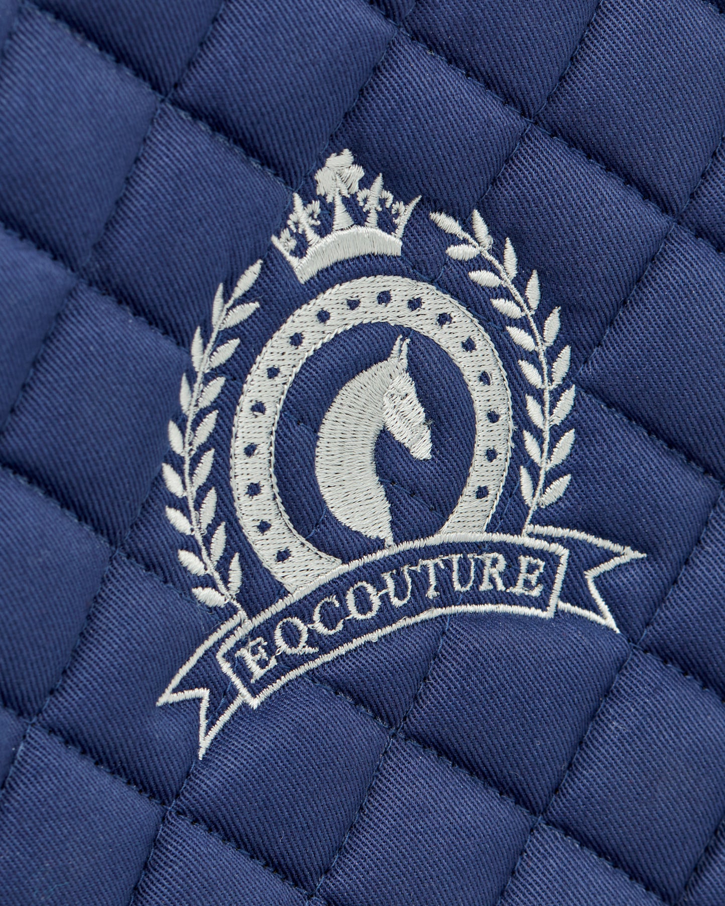 Equestrian navy quilted cotton dressage saddle pad/numnahs.