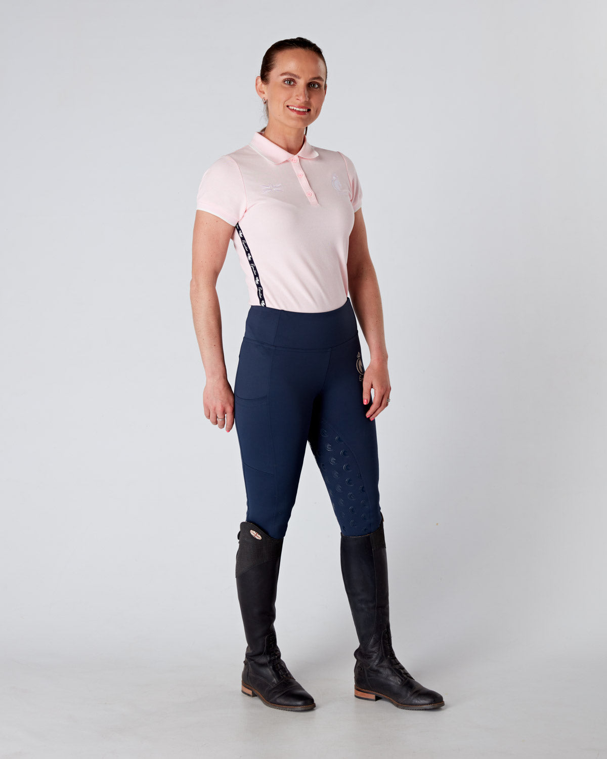 Equestrian pink short sleeve polo top. Tapered, fitted classic polo.