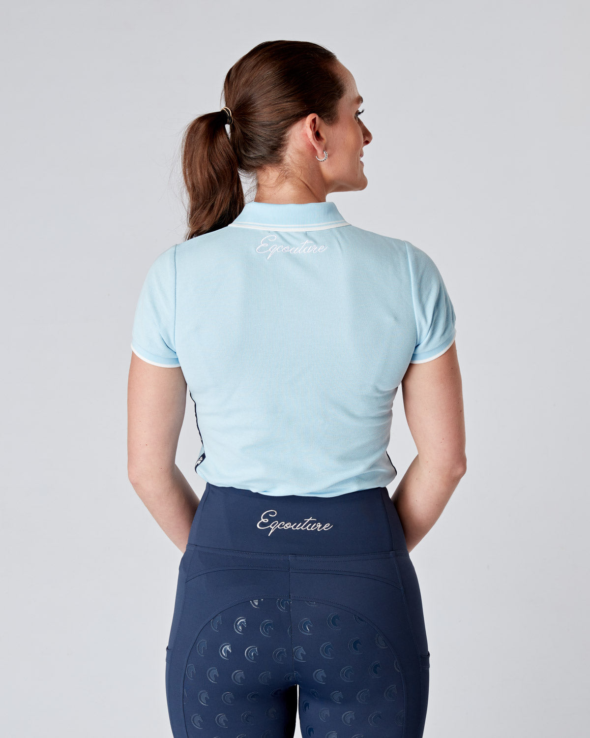 Equestrian blue short sleeve polo top. Tapered, fitted polo.
