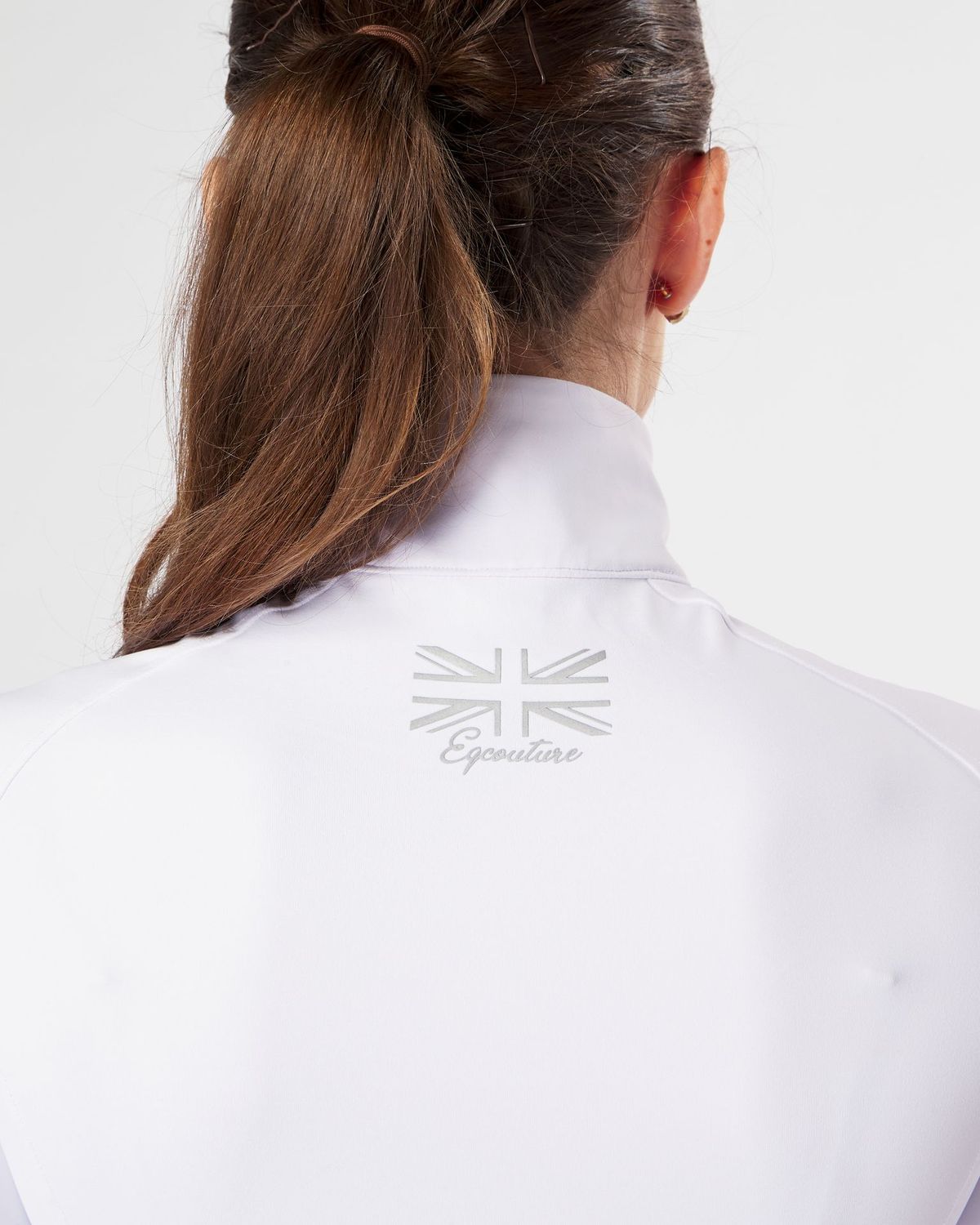 white competition technical equestrian base layer / show shirt sports horse riding top