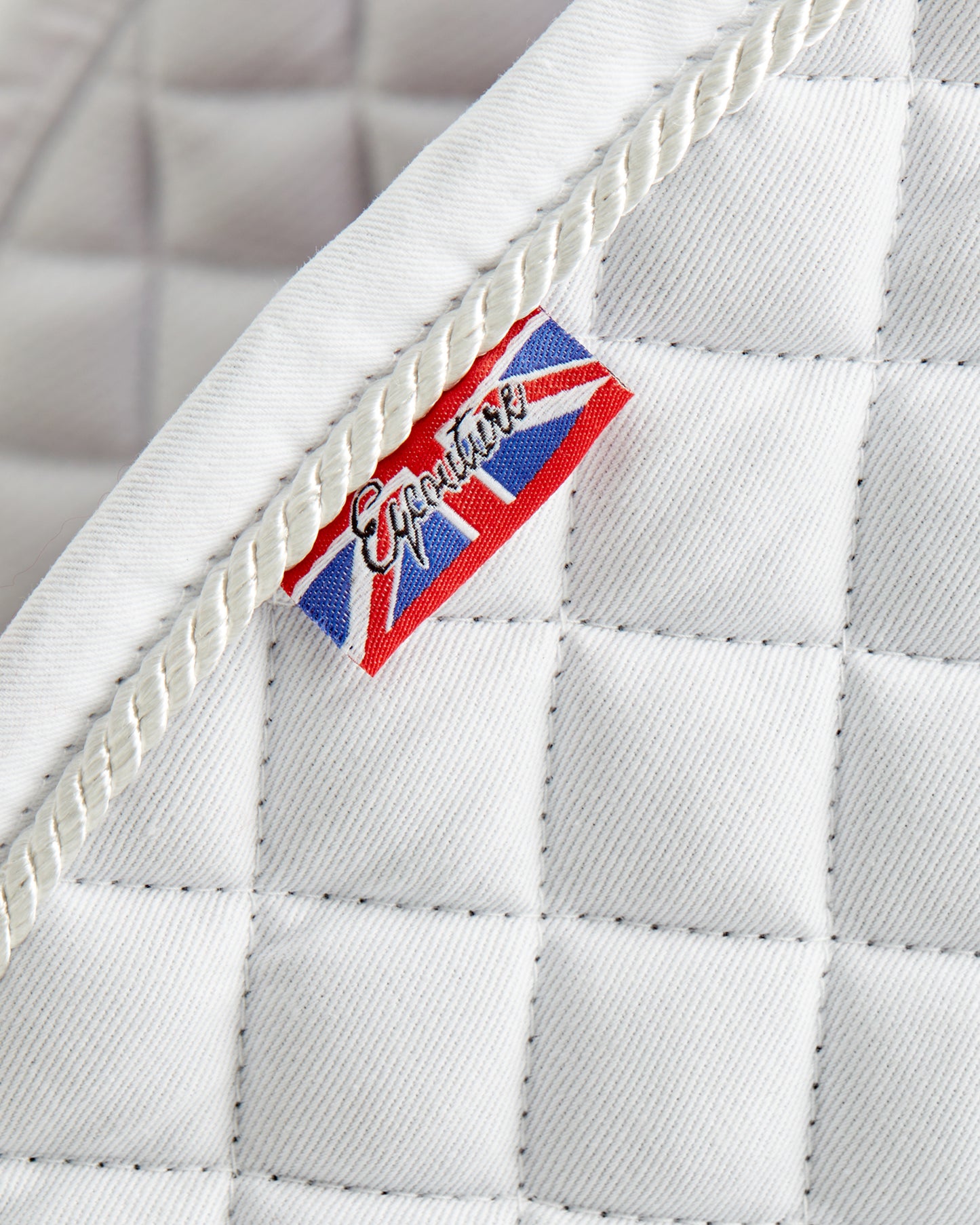 Equestrian white competition quilted jumping saddle pad/numnahs.