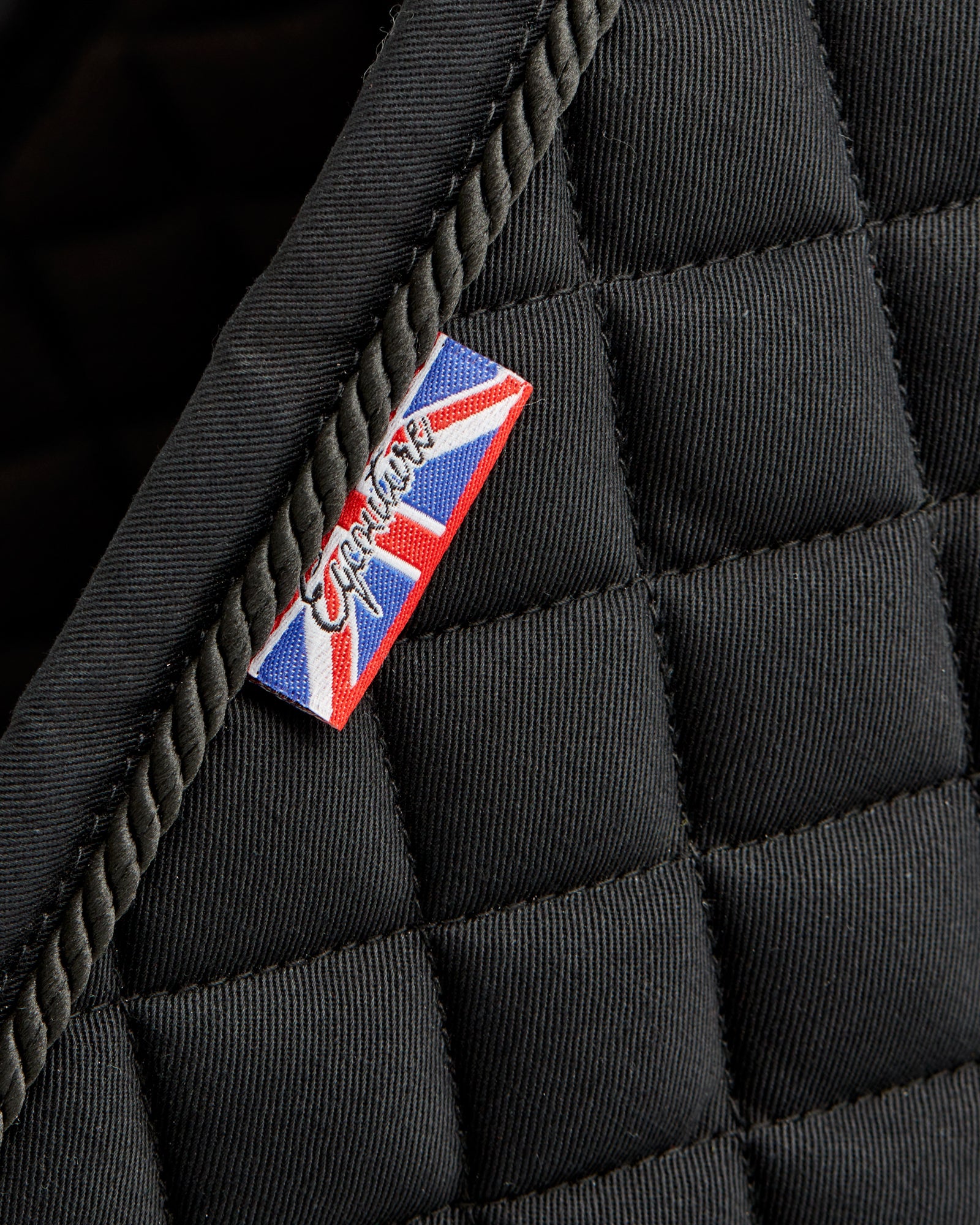 Equestrian black quilted cotton dressage saddle pad/numnahs