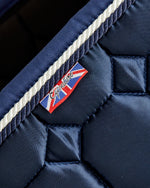 Load image into Gallery viewer, Equestrian luxury quilted navy satin jumping cut saddle pads/numnahs.

