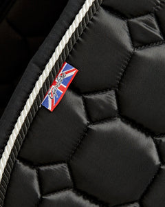Equestrian luxury quilted black satin dressage cut saddle pads/numnahs.