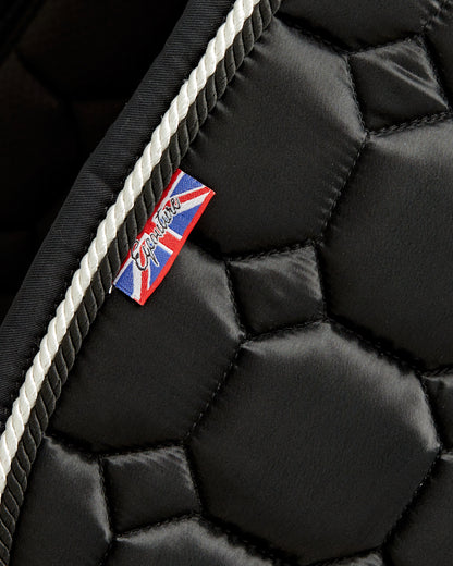 Equestrian luxury quilted black satin jumping cut saddle pads/numnahs.