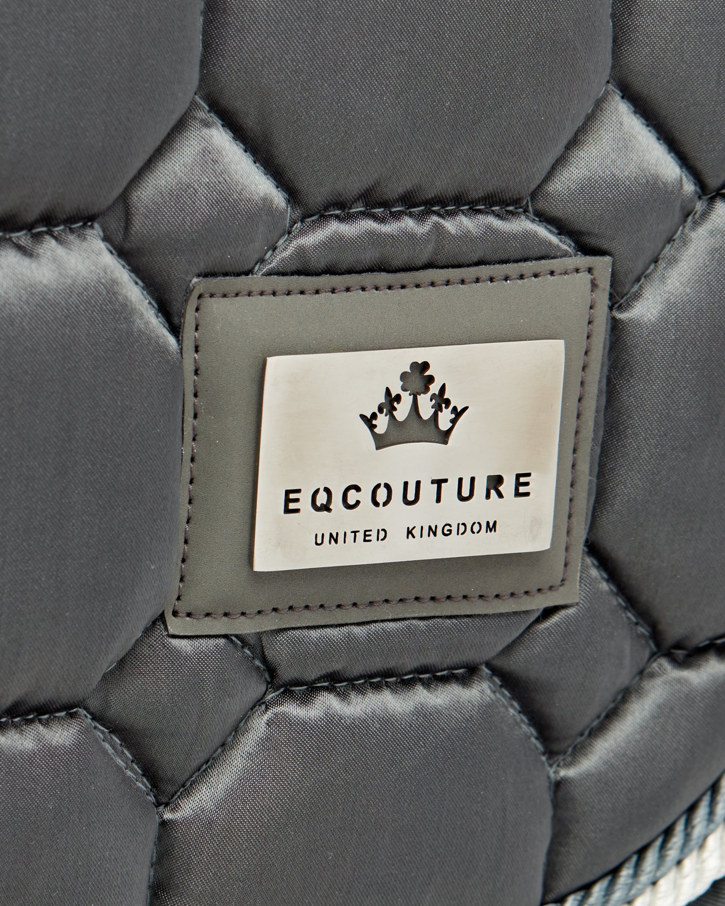 Equestrian luxury quilted grey satin jumping cut saddle pads/numnahs.