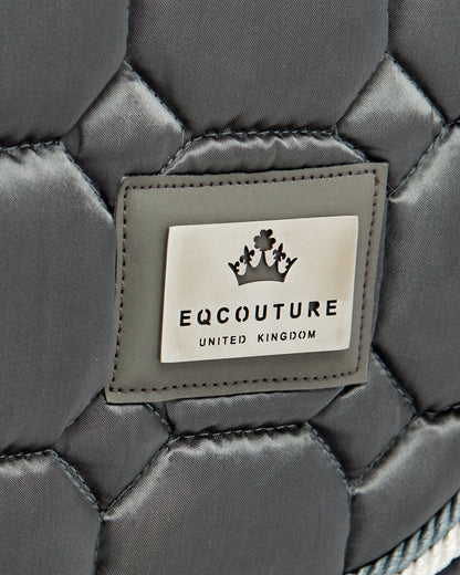 Equestrian luxury quilted grey satin jumping cut saddle pads/numnahs.