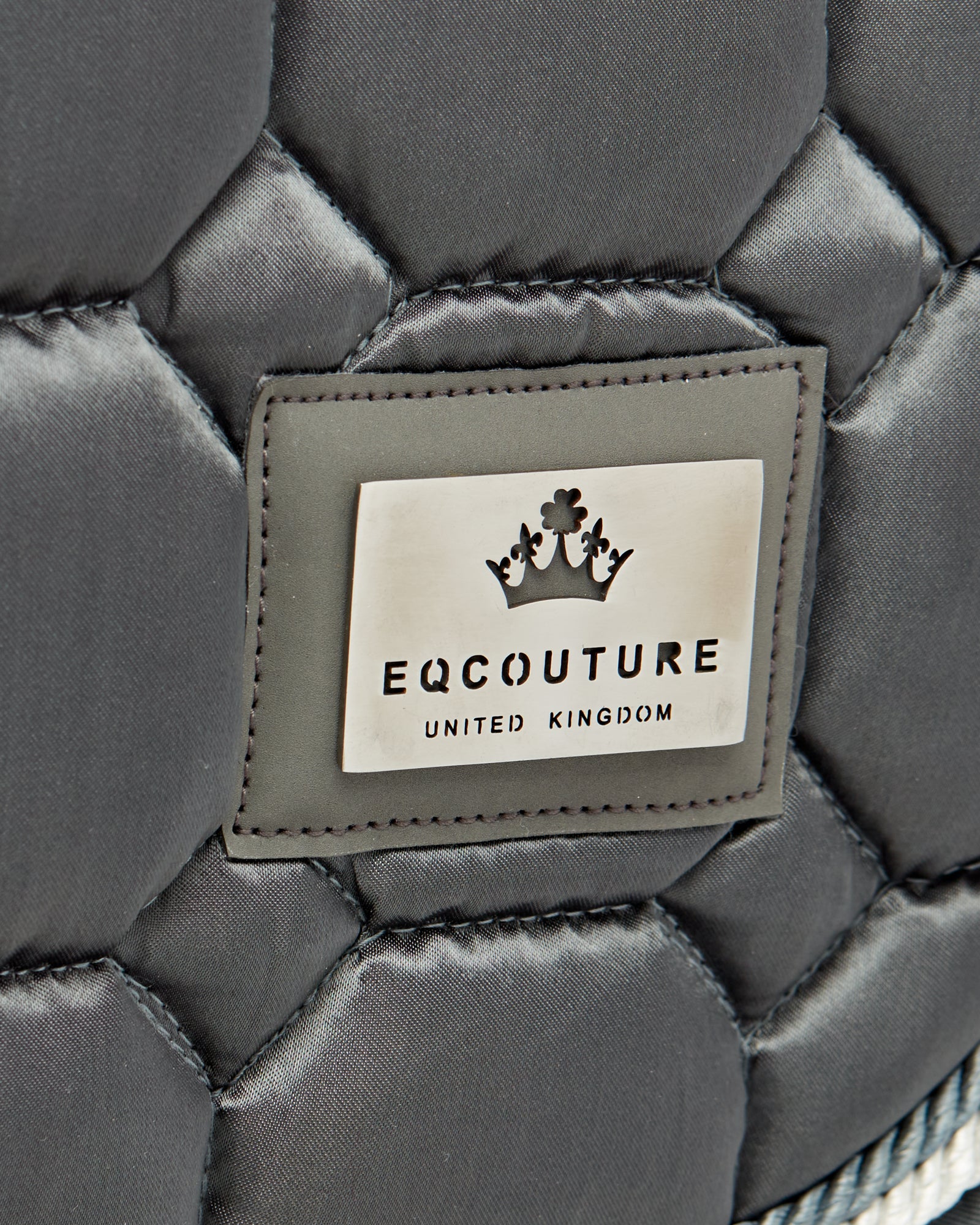 Equestrian luxury quilted Grey satin dressage cut saddle pads/numnahs.