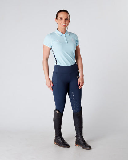 Equestrian blue short sleeve polo top. Tapered, fitted polo.